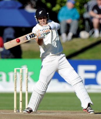 New Zealand batsman Trent Boult hits a six off South Africa's Vernon Philander on day three of...