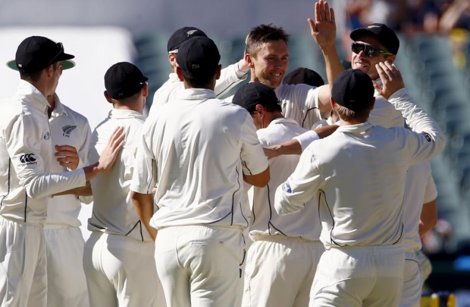 New Zealand celebrates taking a wicket during the third test against Australia. Photo: Reuters