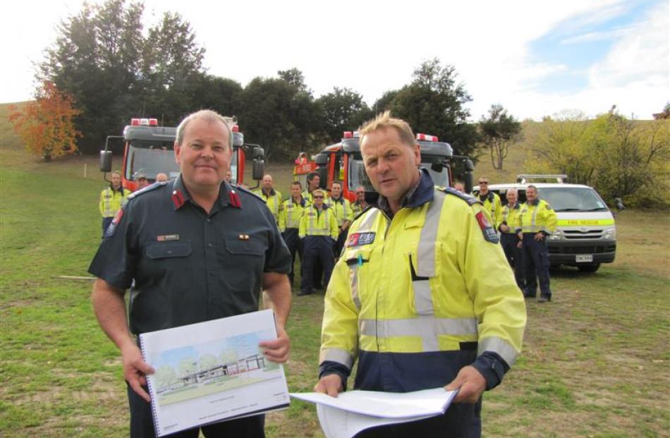 New Zealand Fire Service National Commander Paul Baxter (left), Wanaka Volunteer Fire Brigade...