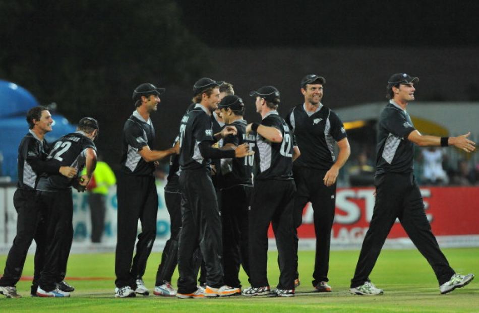 New Zealand players celebrate the series victory over South Africa after winning the second one...