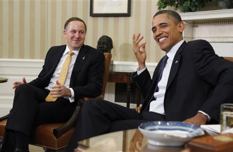 New Zealand Prime Minister John Key (left) and US President Barack Obama in the Oval Office of...