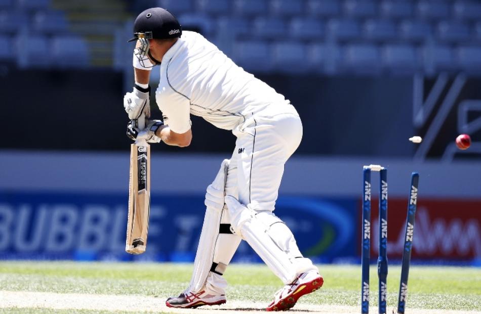 New Zealand's Cory Anderson is bowled out by India's Mohammed Shami on day three of the first...