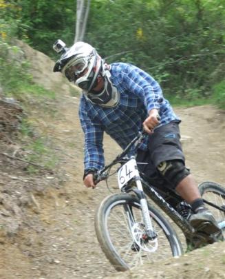 Nick Kemp finishes a run in the men's open division of the Ben Lomond Downhill Southern Series...