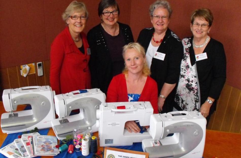 nner Wheel Club members Margaret Bullmen (left), Jean MacNicol (second from right) and Nova...