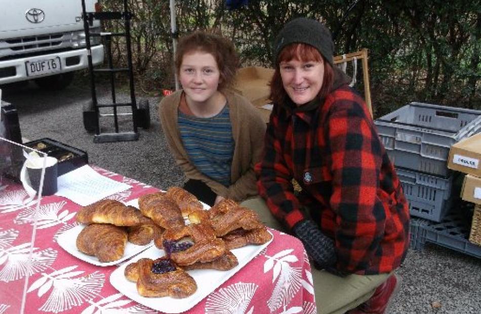 Nora Maarleveld (left) and Tessa Chishom sell baking  for Bellbird Baked Goods at the...