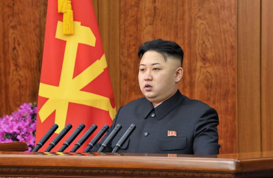North Korean leader Kim Jong-un delivers a New Year address in Pyongyang in this picture released...