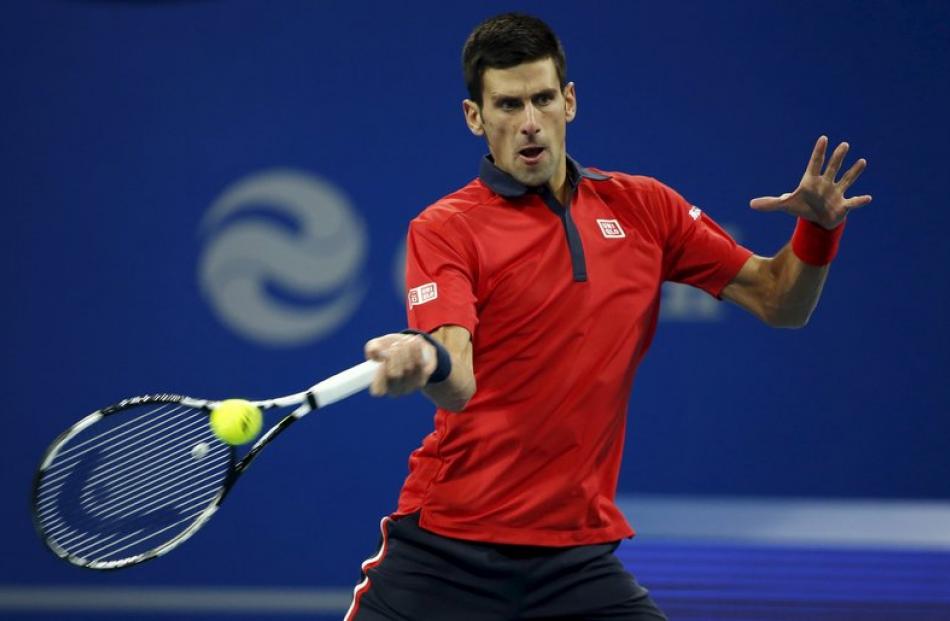 Novak Djokovic plays a shot at the China Open. Photo: Reuters