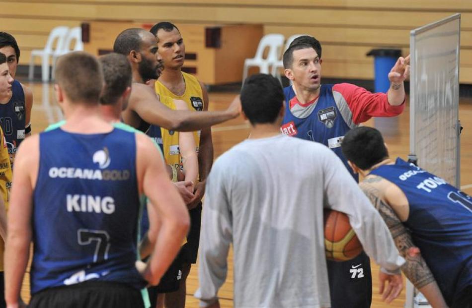 Nuggets player-coach Mark Dickel explains some tactics to his team at the Edgar Centre. Photos by...