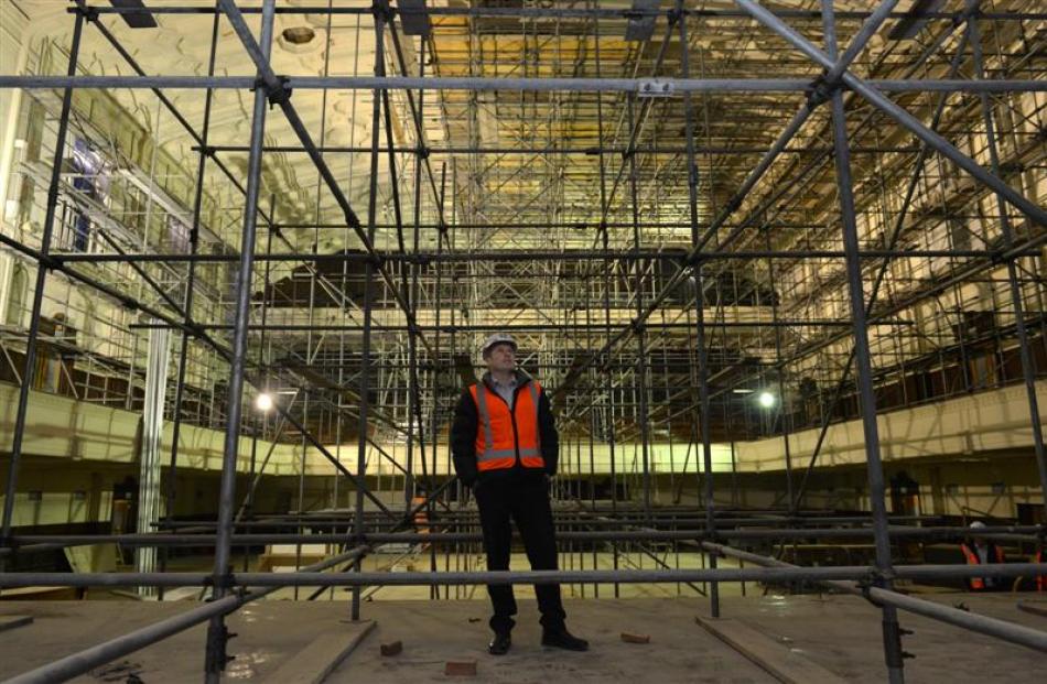 Octa Associates director David Booth surveys the birdcage of scaffolding taking shape inside the...