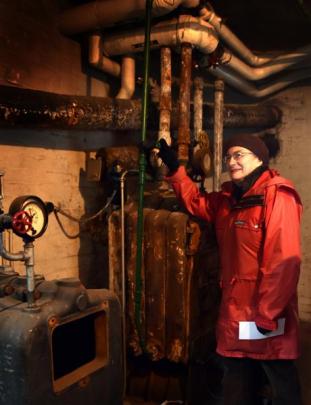 Olveston visitor Cynthia Greensill admires the house's normally hidden original boilers.