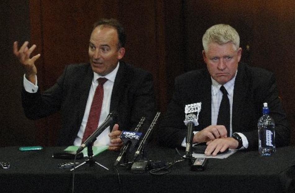 ORFU chairman Wayne Graham (left) and NZRU chief executive Steve Tew break the news to supporters...