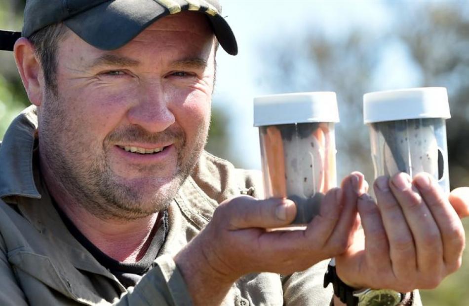 Orokonui conservation manager Elton Smith with takahe eggs ready for to be swapped. Photo by...