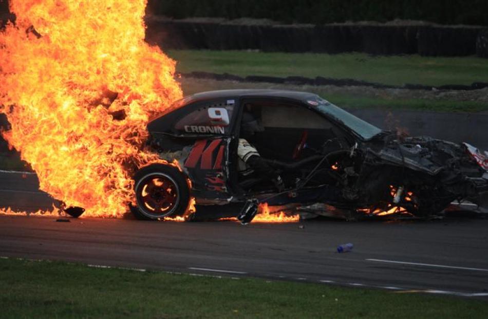 Osca series driver Matt Cronin's Toyota is involved in a high-speed three-car crash with Neville...