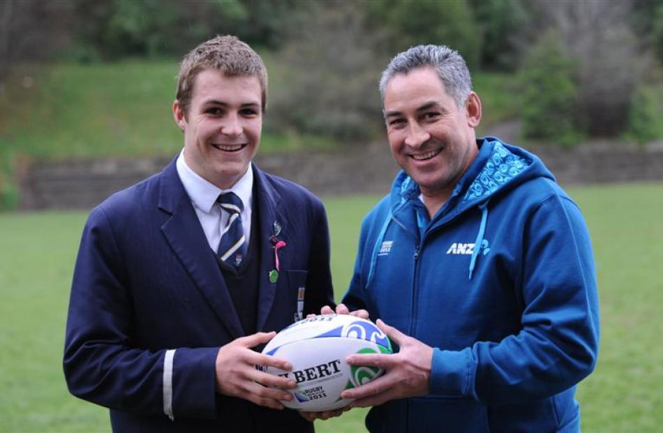 Otago Boys' High School First XV captain Michael Collins and former All Black Frank Bunce at the...
