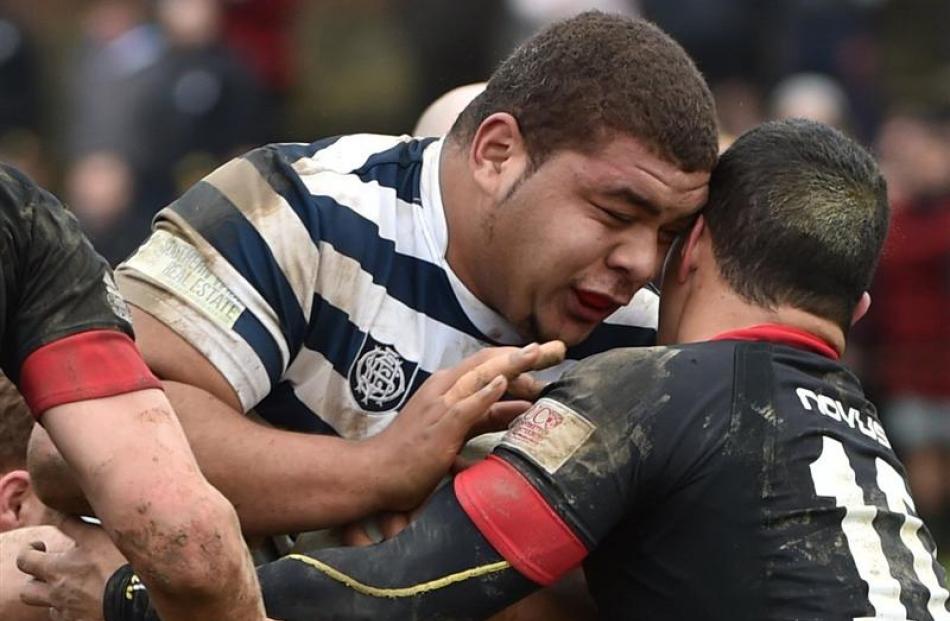 Otago Boys' High School's 135kg prop Sione Asi prevails against the a St Bede's  defender in the...