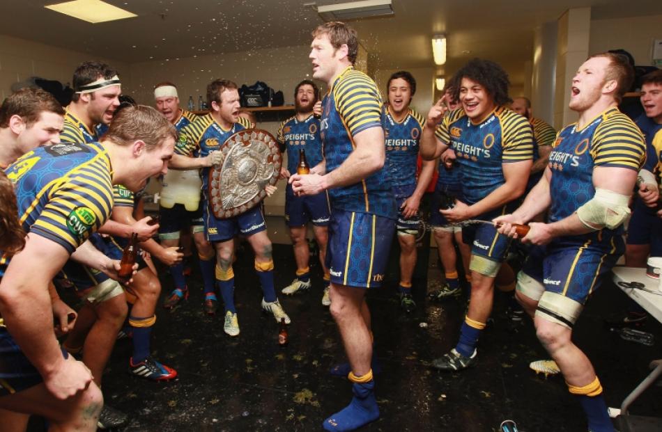Otago celebrate in the changing room after winning the round two ITM Cup Ranfurly Shield match...