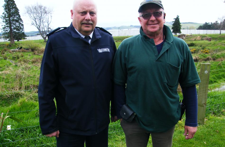 Otago Corrections Facility  manager Jack Harrison (left) and dairy farm principal instructor Tony...