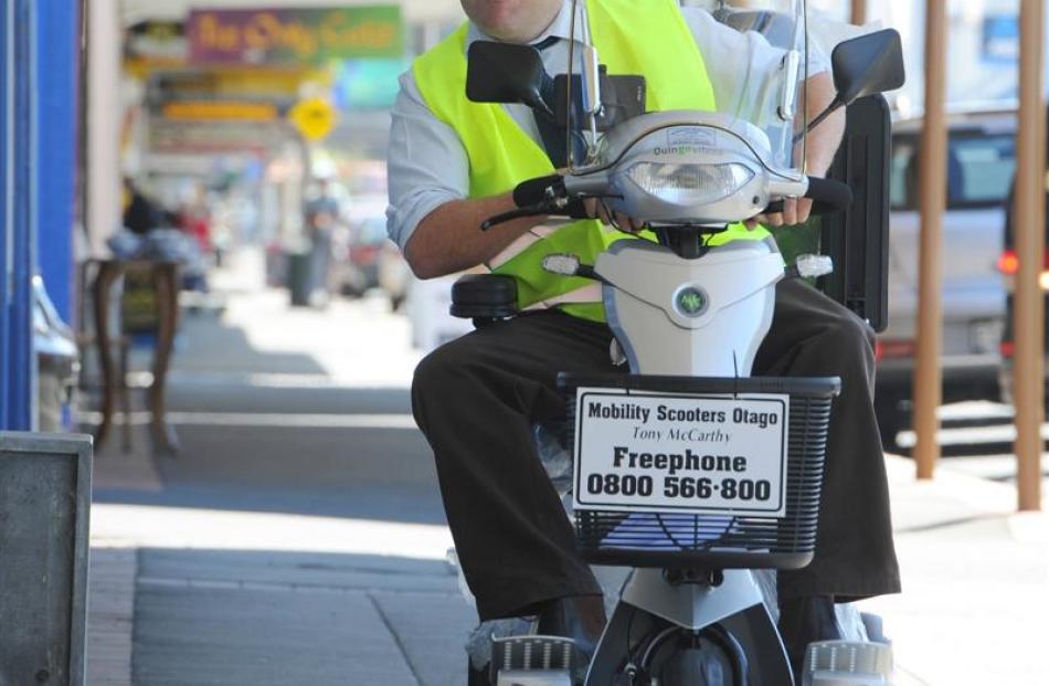 Otago Daily Times reporter Shawn McAvinue gives a mobility scooter a whirl in South Dunedin...