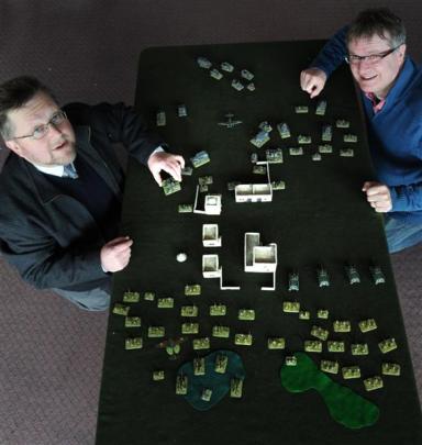 Otago Miniature Tacticians' Society member David Shead  (left) and president Bill Kearney prepare...