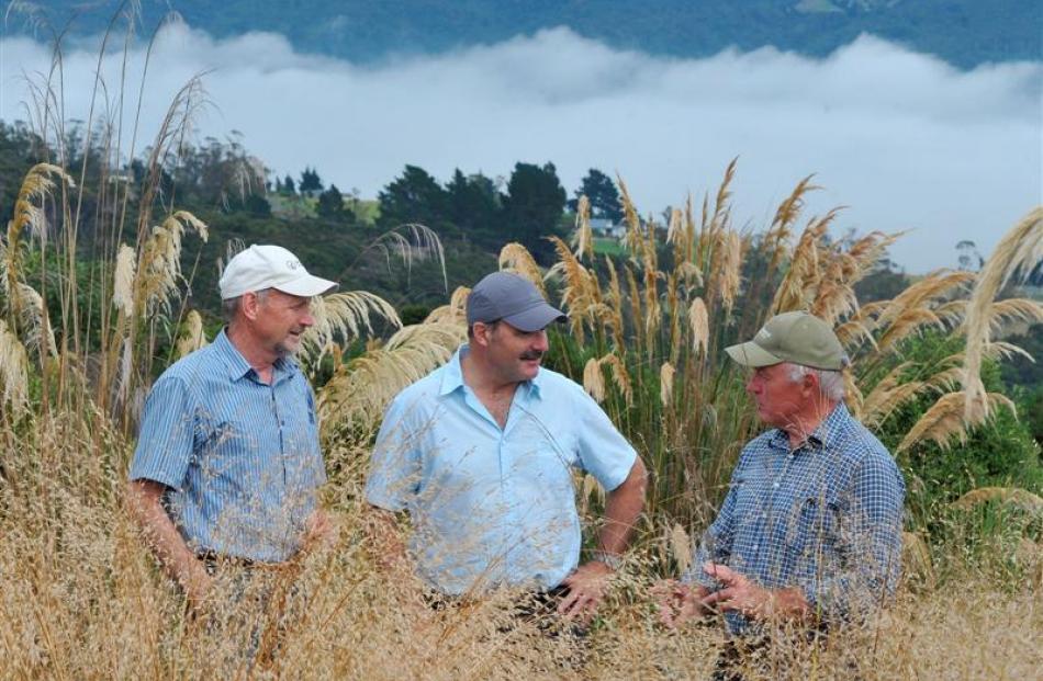 Otago Natural History Trust chairman Neville Peat  (left), Department of Conservation director...