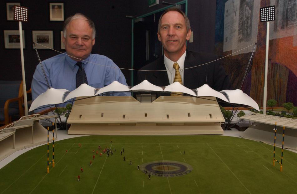 Otago Regional Council chairman Duncan Butcher (left) considers a scale model of the proposed $20...