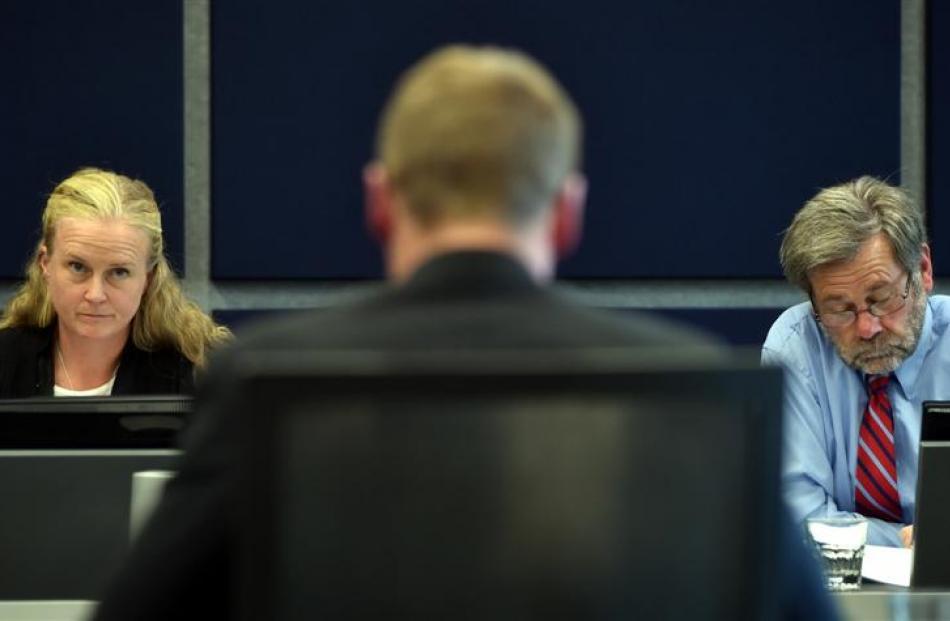 Otago regional councillors Gretchen Robertson and Trevor Kempton listen to Federated Farmers...