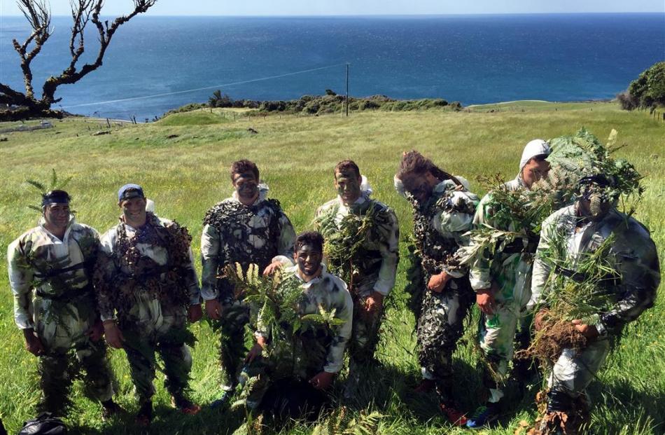 Out in the Catlins sun on Monday looking to hunt in the bush in camouflage gear are Highlanders...