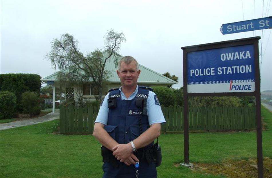 Owaka sole-charge officer Senior Constable Murray Hewitson outside his station. Photo by Helena...