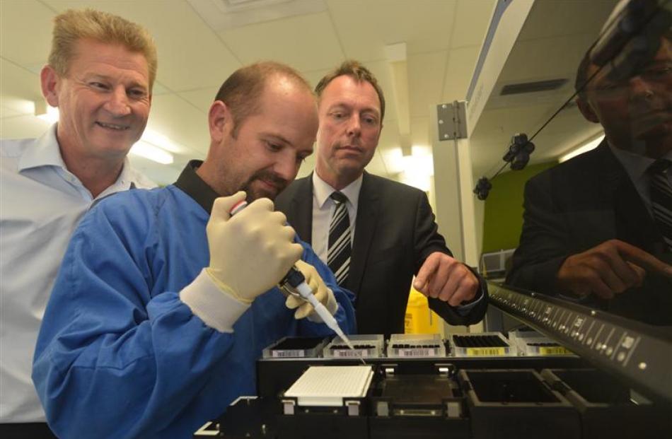 Pacific Edge chief executive David Darling (left) senior scientist Justin Harvey (centre) and...