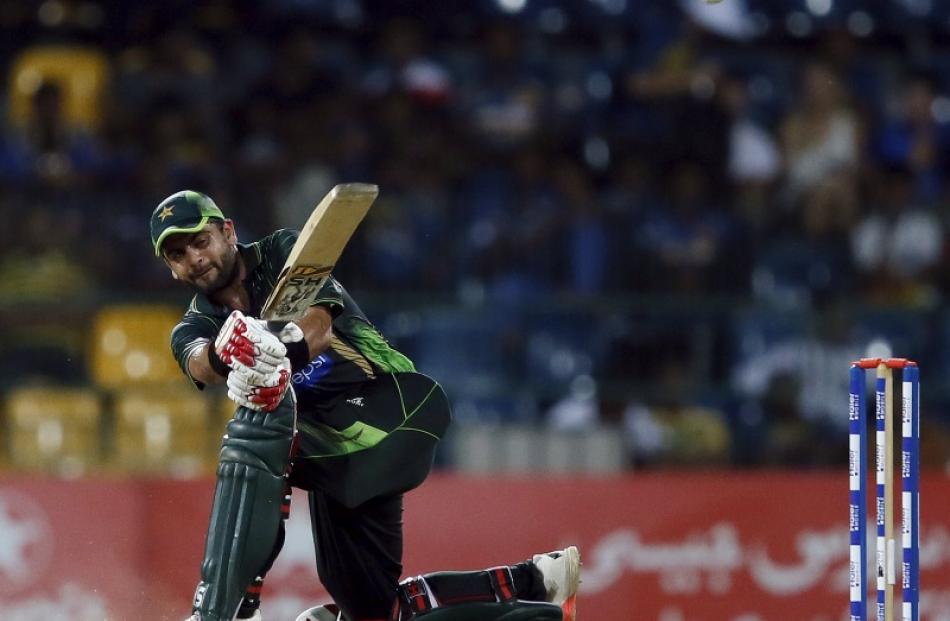 Pakistan's Ahmed Shehzad plays a shot during their fourth one-day international cricket match...