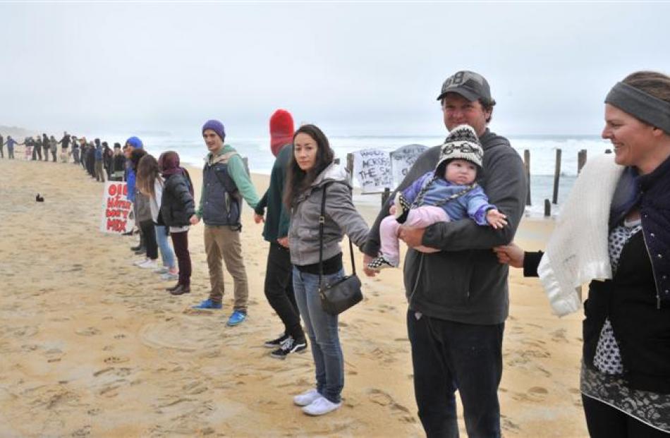 Parents Steve McGregor and Anita Zainey (right), of Dunedin, with daughter Aguilla. Photo Linda...