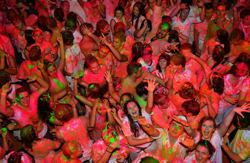 Partygoers turn  fluorescent at the Illuminate Paint Party at Forsyth Barr Stadium in Dunedin...