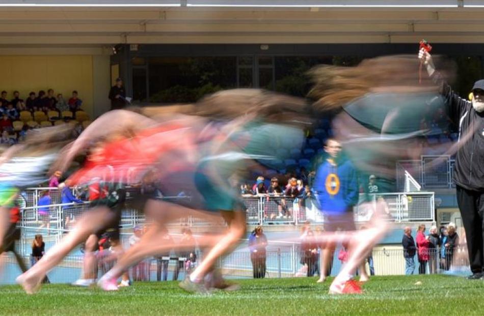Paul Tyson starts a hurdles race at the Otago primary schools athletics held at the Caledonian...