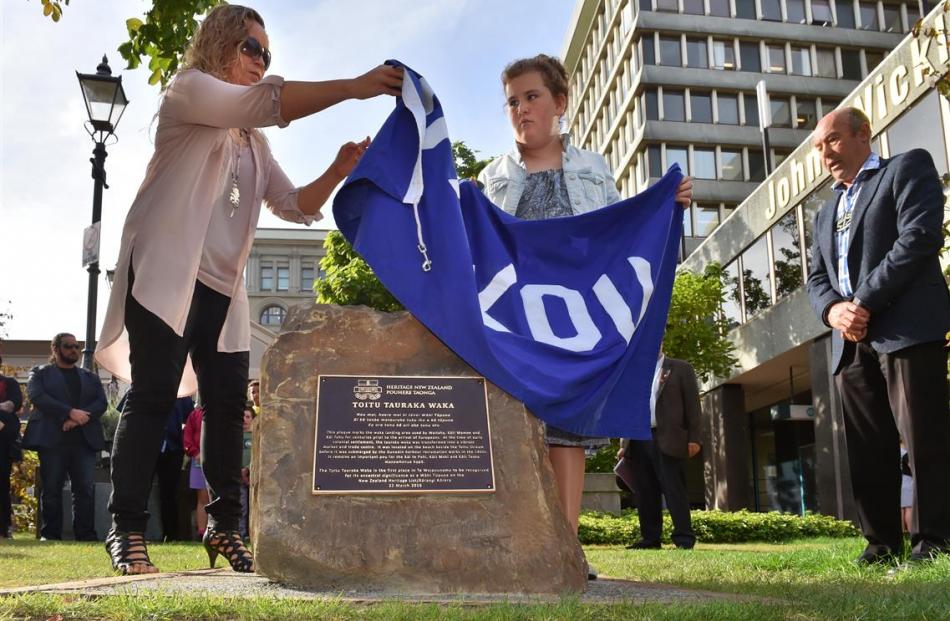Paulette Tamati-Eliffe (left) and Ripeka Potiki unveil a commemorative plaque marking the...