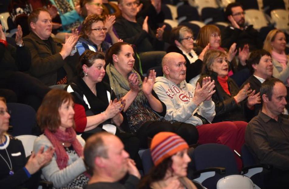 People of South Dunedin applaud benefit concert. Photos by Peter McIntosh.