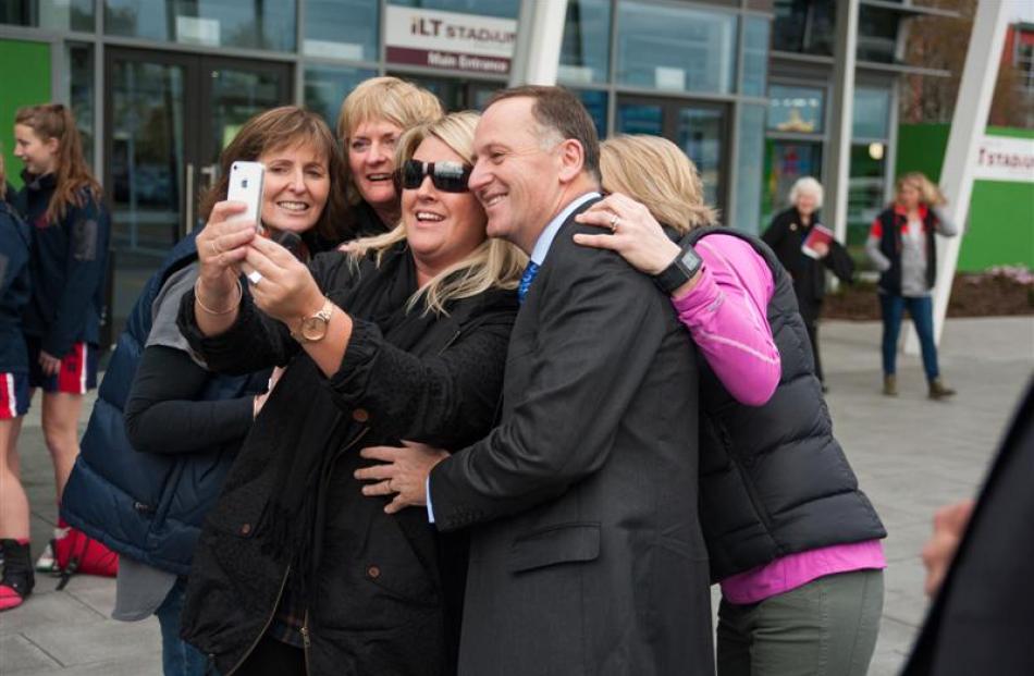 People swarmed for a selfie with Prime Minister John Key when he arrived at ILT Stadium Southland...