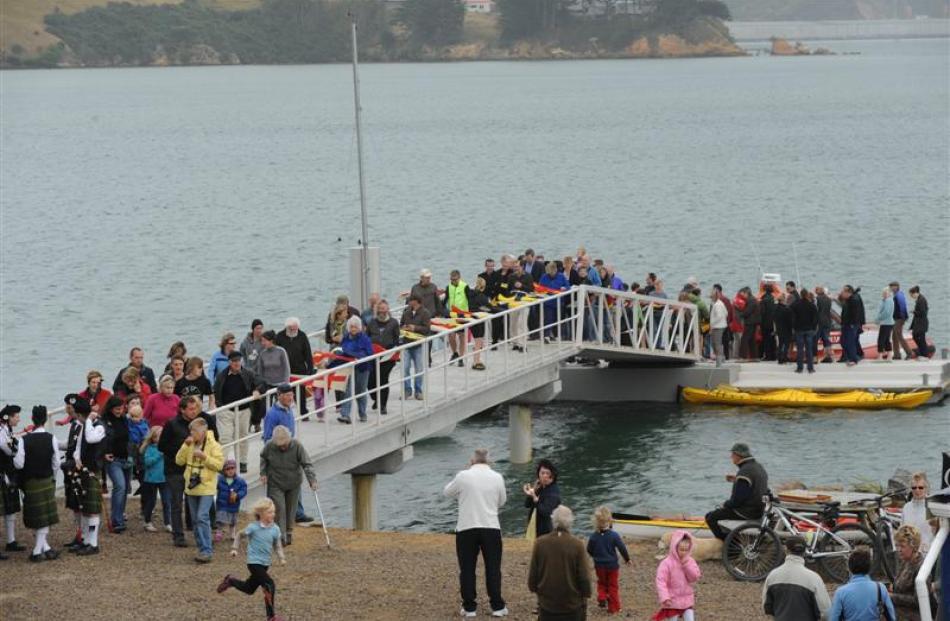 People walk  the officially opened Portobello Jetty on Saturday afternoon. Photo by Jane Dawber.