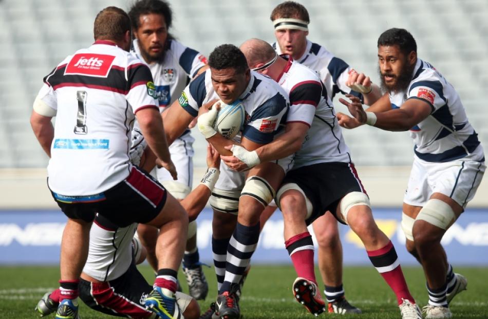Peter Saili of Auckland is tackled during the round one ITM Cup match between Auckland and North...