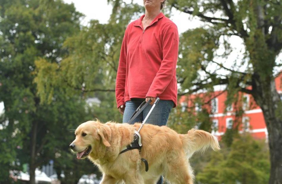 Petronella Spicer and her guide dog Fletcher, in Dunedin yesterday. The pair  are prepared for...