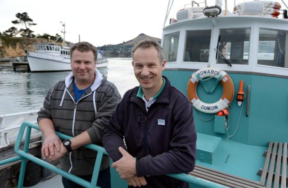 Phil (left) and Sean Heseltine both work on the ocean, Phil offshore on  Polaris II and Sean...