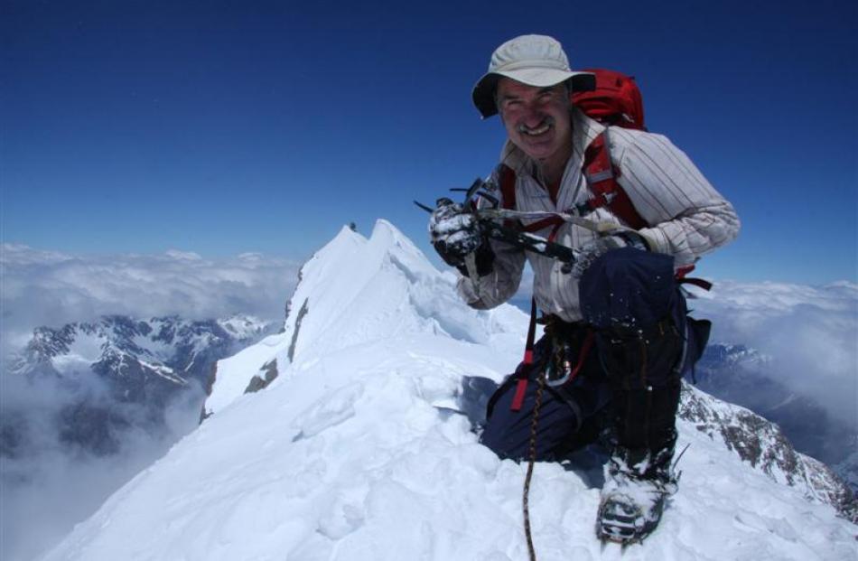 Philip Somerville revels in the satisfaction of being on the top of Aoraki Mount Cook. Photos by...