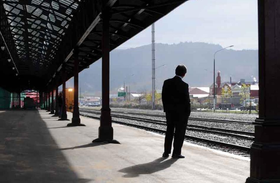 Mayor of Dunedin Peter Chin waits for the train to arrive at Dunedin Railway Station.