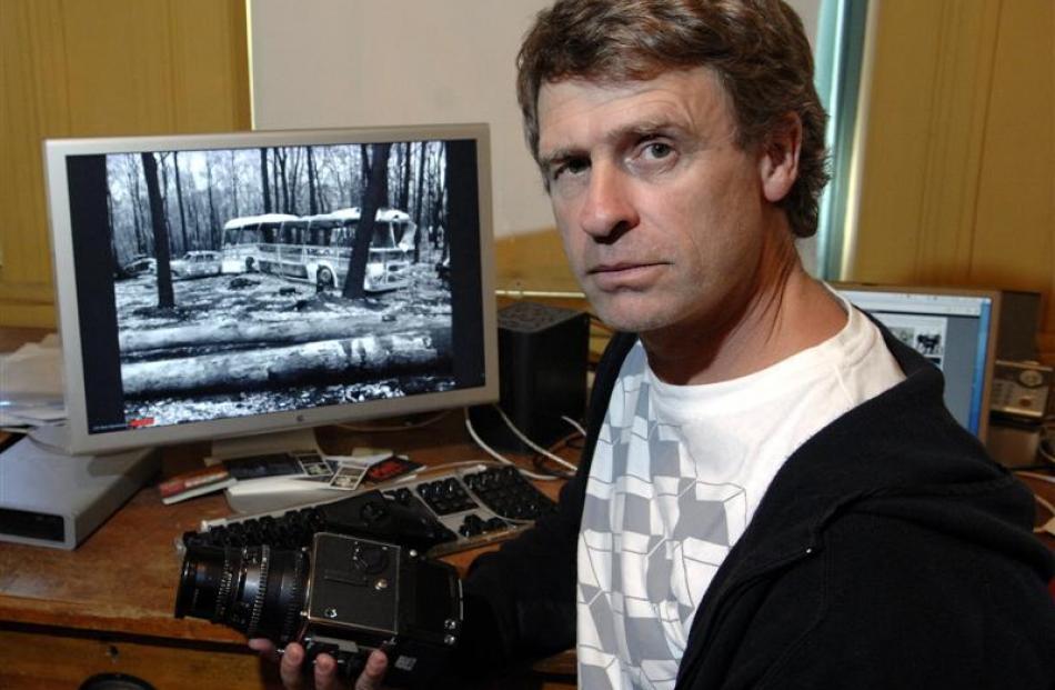 Photographer Alan Dove with his medium-format Hasselblad camera, which he used to capture the...