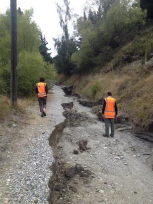 Council staff inspecting a section of the Glenda Dr trail in March after heavy rain. Photos supplied