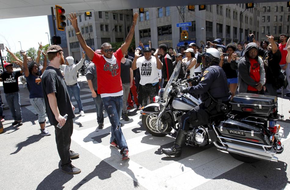 Police block protesters in Cleveland at the weekend following the not guilty verdict for officer...