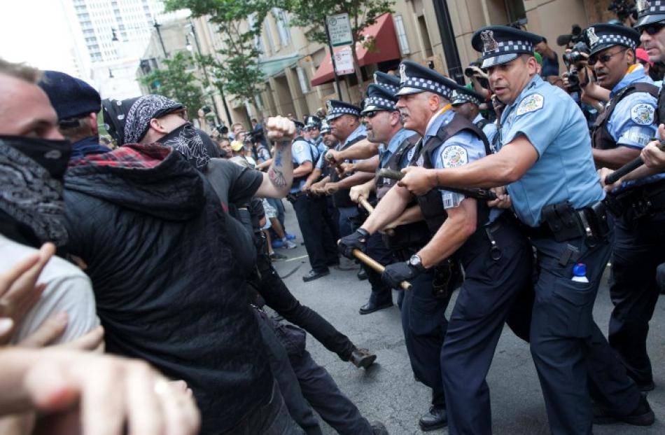 Police clash with protesters during an anti-NATO protest march in Chicago. REUTERS/Andrew Kelly