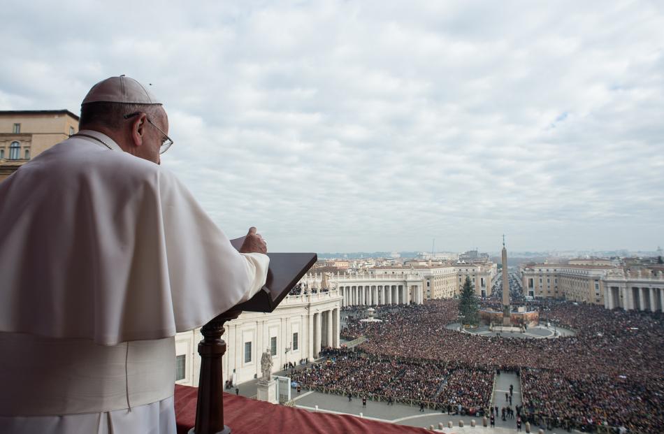 Pope Francis delivers a "Urbi et Orbi" (to the city and world) message from the balcony...