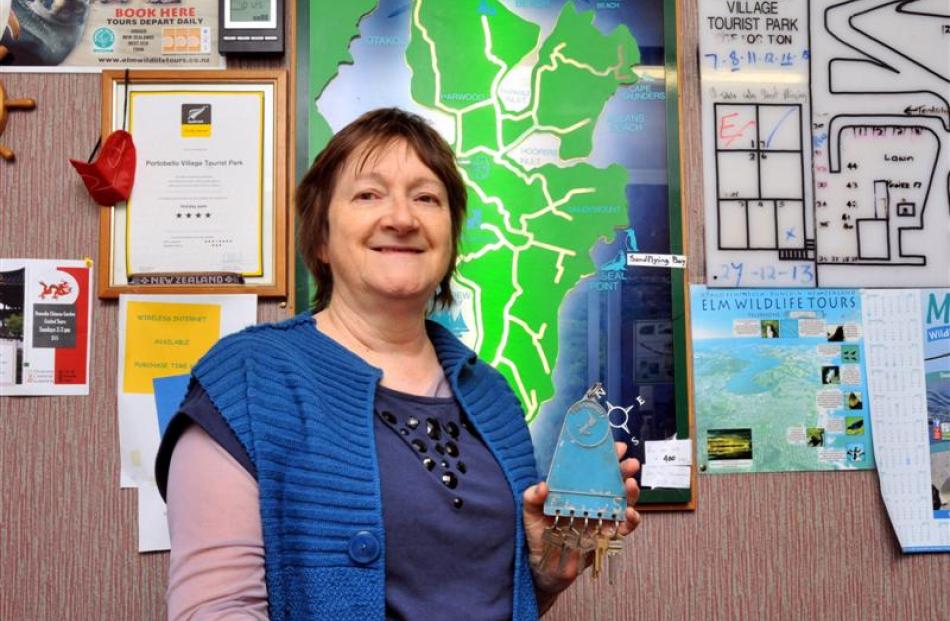Portobello Village Tourist Park owner Sherryl Charles with the keys that are rattled at campers...
