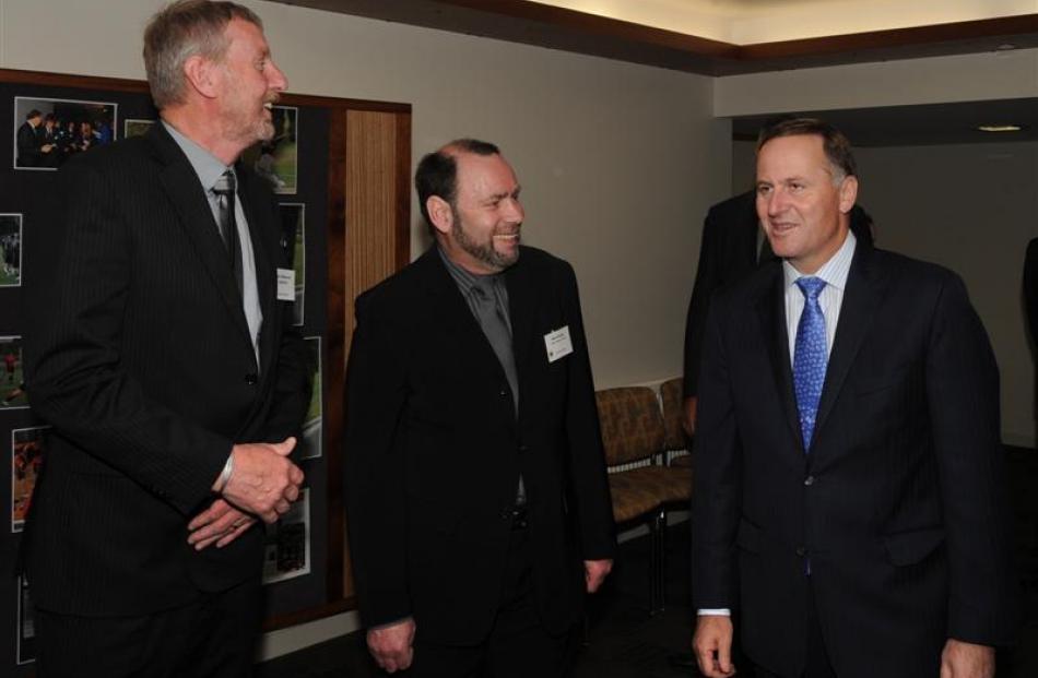 Prime Minister John Key meets Kaikorai Valley College principal Rick Geerlofs (left) and board of...