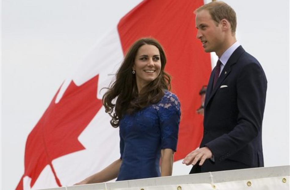 Prince William and Kate, the Duke and Duchess of Cambridge, leave the HMCS Montreal as they...
